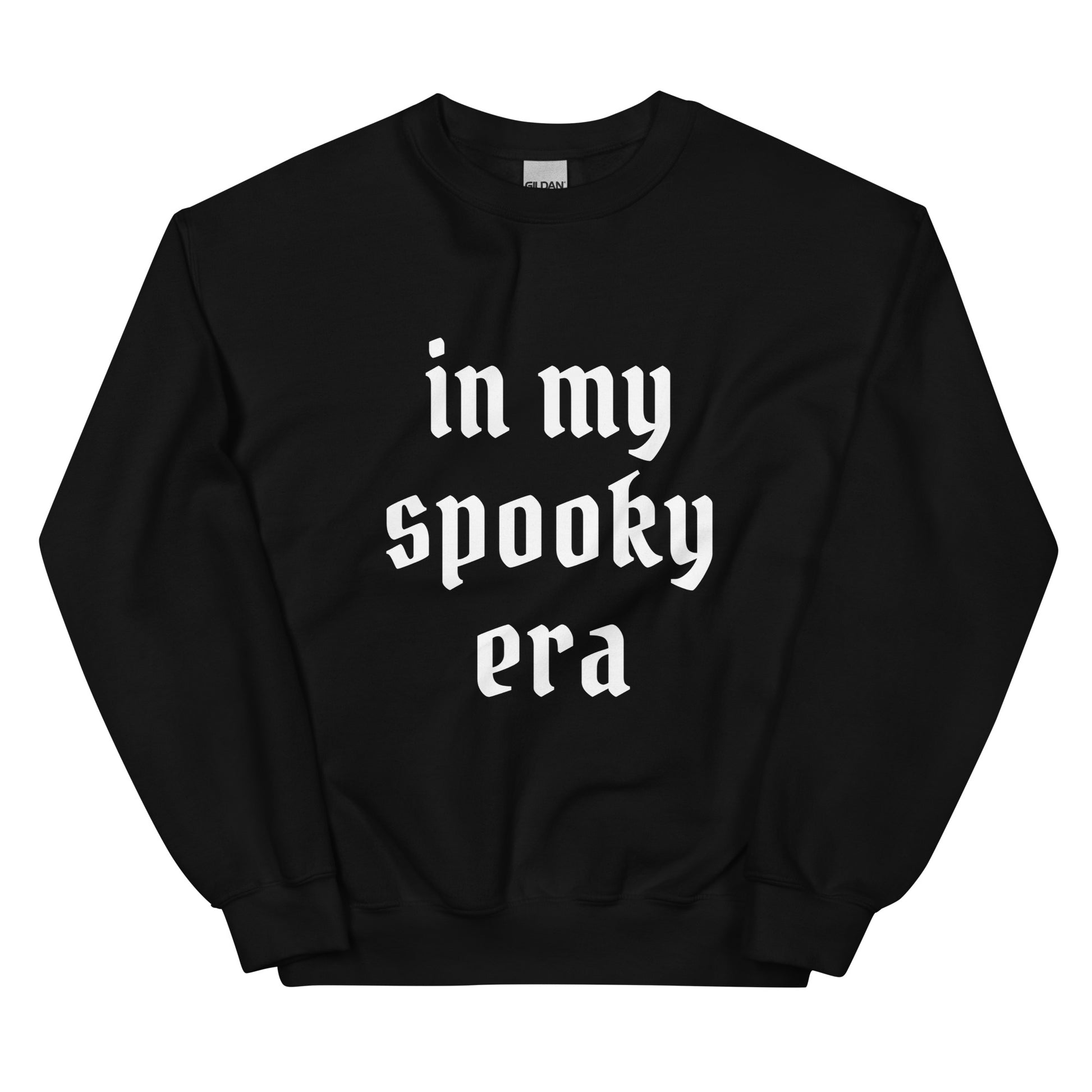 A black crewneck sweatshirt that says "in my spooky era" in white gothic font