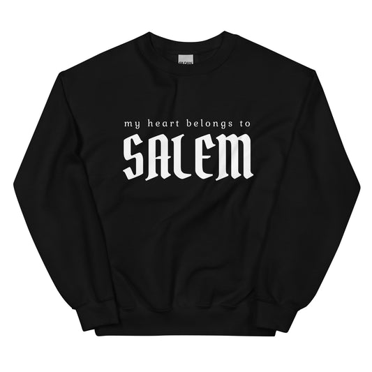 A black crewneck sweatshirt that says "My heart belongs to Salem" in a gothic white font