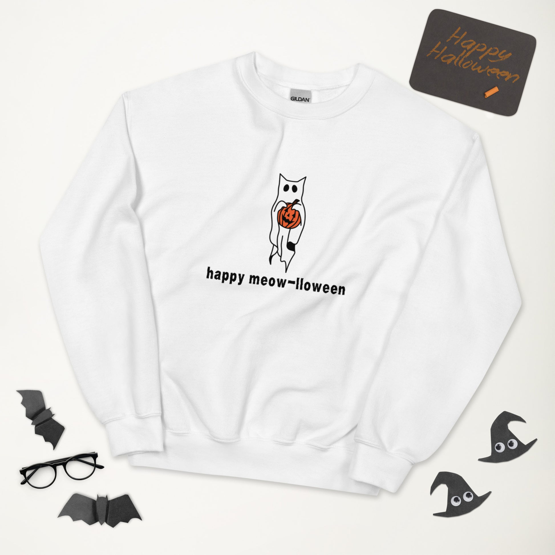 A white Halloween crewneck sweatshirt featuring a ghost with cat ears, holding a jack-o-lantern, with the phrase "Happy Meow-lloween" underneath