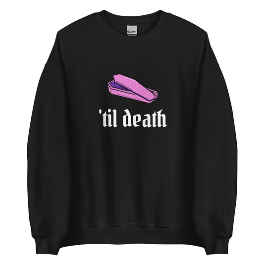 A black crewneck sweatshirt featuring a pink and purple coffin, with the phrase 'til death written in white gothic letters