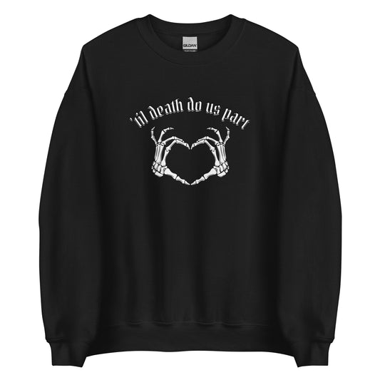 A black crewneck sweatshirt featuring two skeleton hands forming a heart, and the phrase 'Til death do us part in white gothic letters