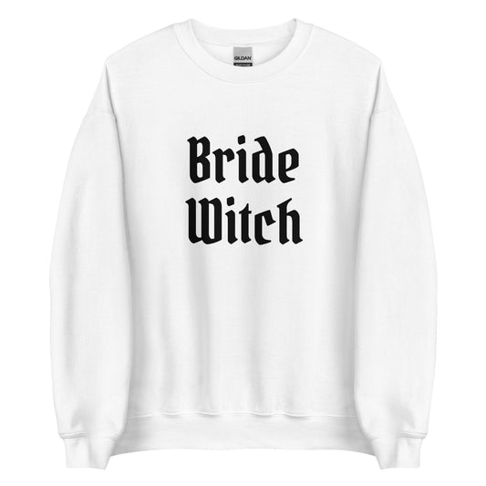 A white bachelorette party sweatshirt that says Bride Witch in black gothic-style letters